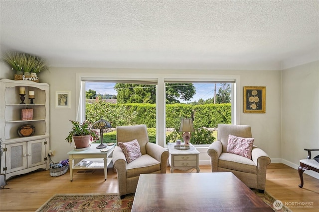 910 Crestline Dr, Longview, WA 98632 - living area featuring wood finished floors and a textured ceiling