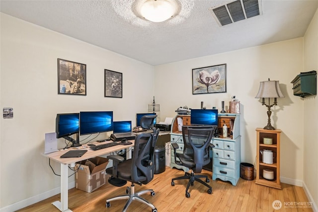910 Crestline Dr, Longview, WA 98632 - office area with light wood-type flooring and a textured ceiling