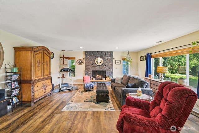 910 Crestline Dr, Longview, WA 98632 - living room with wood finished floors, a fireplace, and recessed lighting