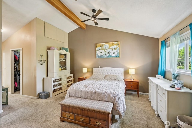 910 Crestline Dr, Longview, WA 98632 - bedroom with a walk in closet, light carpet, a closet, and a ceiling fan