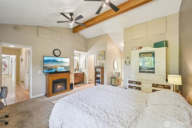 910 Crestline Dr, Longview, WA 98632 - bedroom featuring light carpet, a glass covered fireplace, and ceiling fan