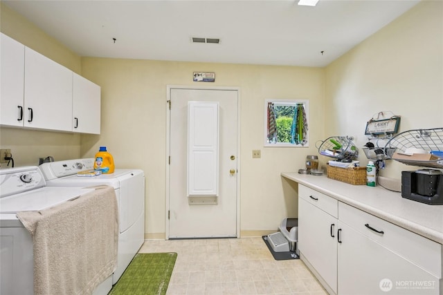 910 Crestline Dr, Longview, WA 98632 - washroom featuring cabinet space and washer and clothes dryer