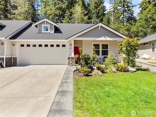 13809 119th Street Ct NW, Gig Harbor, WA 98329 - view of front facade featuring stone siding, an attached garage, concrete driveway, and a front lawn