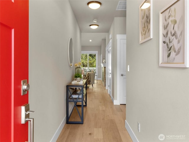 13809 119th Street Ct NW, Gig Harbor, WA 98329 - corridor with wood finished floors and baseboards