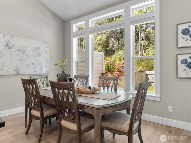 13809 119th Street Ct NW, Gig Harbor, WA 98329 - dining room featuring plenty of natural light and light wood-style floors