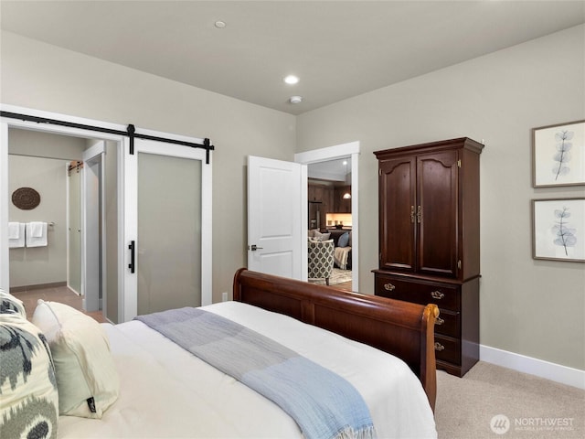 13809 119th Street Ct NW, Gig Harbor, WA 98329 - bedroom featuring a barn door, light colored carpet, and recessed lighting
