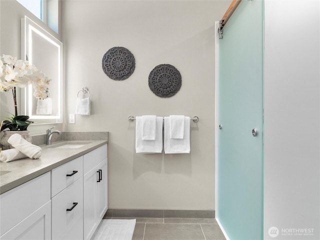 13809 119th Street Ct NW, Gig Harbor, WA 98329 - bathroom with double vanity and tile patterned flooring