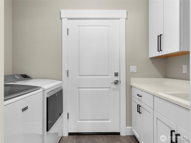 13809 119th Street Ct NW, Gig Harbor, WA 98329 - laundry area with washing machine and dryer, cabinet space, and dark wood finished floors