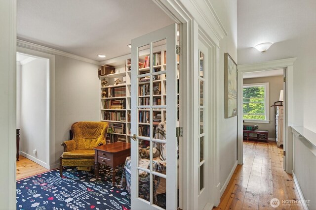 909 308th St NE, Stanwood, WA 98282 - living area with wood-type flooring, crown molding, and recessed lighting