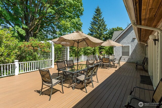 909 308th St NE, Stanwood, WA 98282 - wooden terrace featuring outdoor dining area