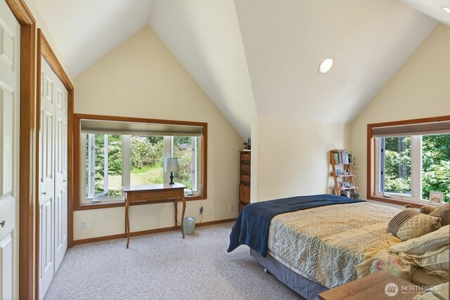 909 308th St NE, Stanwood, WA 98282 - bedroom featuring vaulted ceiling, multiple windows, carpet floors, and recessed lighting