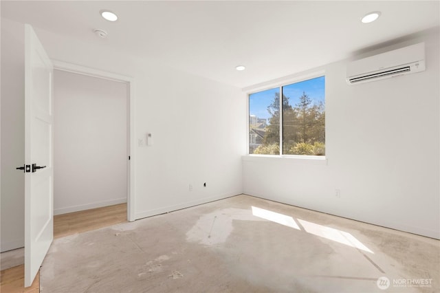 6544D Latona Ave NE, Seattle, WA 98115 - unfurnished room featuring a wall mounted AC, recessed lighting, and a smoke detector