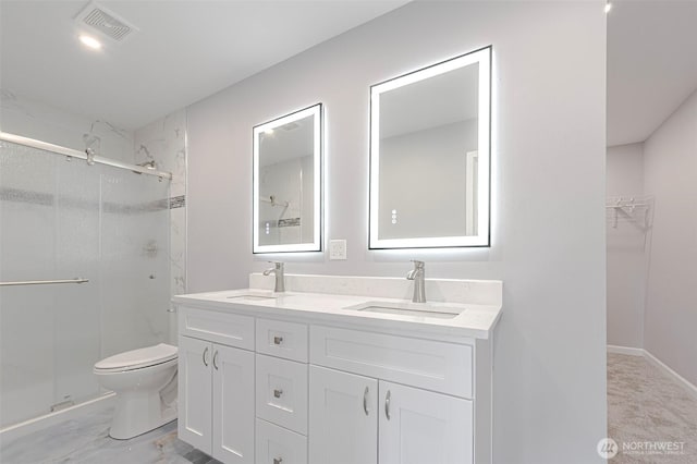 3 Burning Tree Dr Unit 3, Yakima, WA 98902 - bathroom with a stall shower, double vanity, and a walk in closet