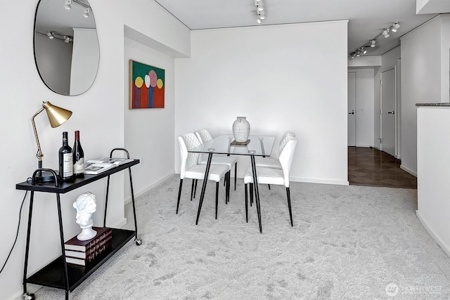 2000 1st Ave Unit 703, Seattle, WA 98121 - carpeted dining space with rail lighting