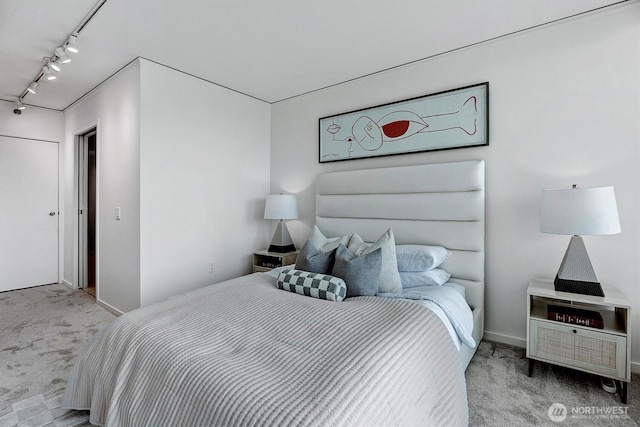 2000 1st Ave Unit 703, Seattle, WA 98121 - bedroom with carpet and rail lighting