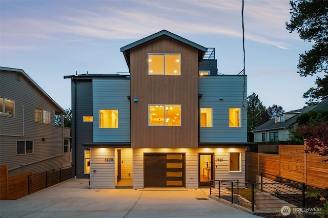 3424 20th Ave S, Seattle, WA 98144 - contemporary home featuring driveway and a garage