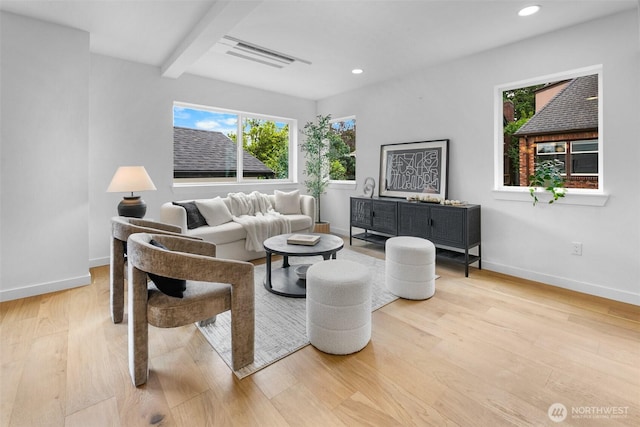 3424 20th Ave S, Seattle, WA 98144 - living area featuring wood finished floors, healthy amount of natural light, recessed lighting, and beamed ceiling