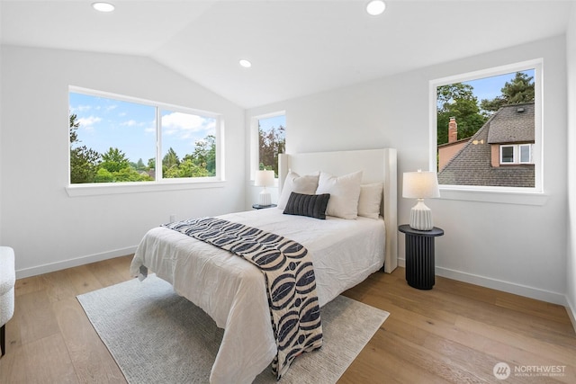 3424 20th Ave S, Seattle, WA 98144 - bedroom featuring lofted ceiling, wood finished floors, and recessed lighting