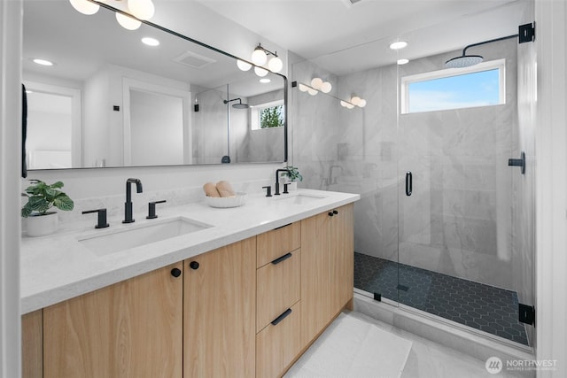 3424 20th Ave S, Seattle, WA 98144 - bathroom featuring a shower stall, double vanity, plenty of natural light, and recessed lighting
