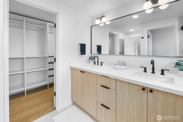 3424 20th Ave S, Seattle, WA 98144 - full bathroom featuring double vanity, a walk in closet, and recessed lighting