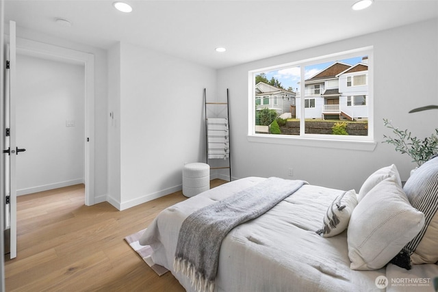 3424 20th Ave S, Seattle, WA 98144 - bedroom with light wood-style flooring and recessed lighting