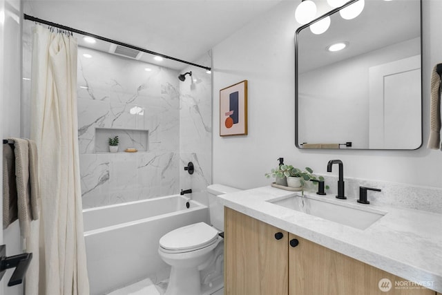 3424 20th Ave S, Seattle, WA 98144 - bathroom featuring vanity, shower / bath combo with shower curtain, recessed lighting, and marble finish floors