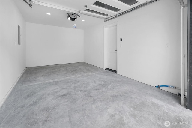 3424 20th Ave S, Seattle, WA 98144 - garage with a garage door opener, recessed lighting, and electric panel