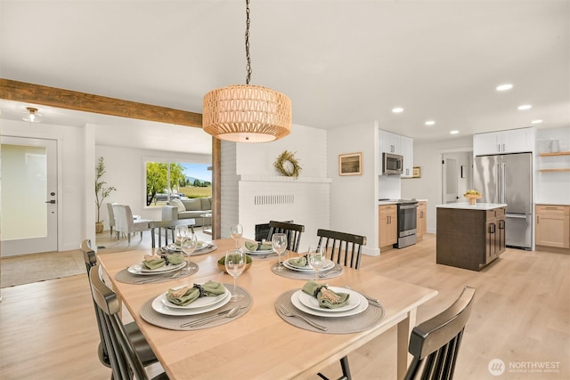 16740 Dunbar Rd, Mount Vernon, WA 98273 - dining room featuring light wood-type flooring, recessed lighting, and beamed ceiling