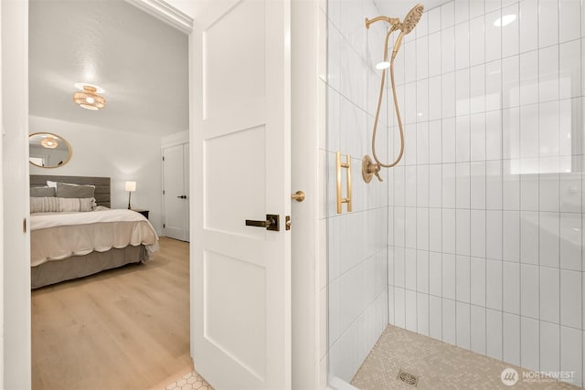 16740 Dunbar Rd, Mount Vernon, WA 98273 - full bath with tiled shower, connected bathroom, and wood finished floors