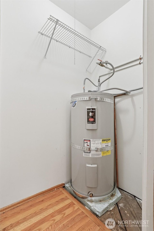 1919 2nd Ave W, Seattle, WA 98119 - utility room featuring strapped water heater