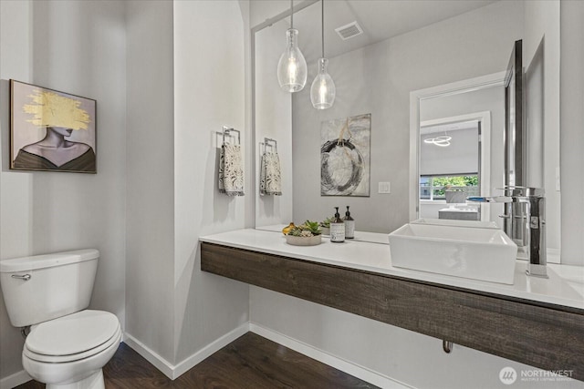 35404 55th Ave S, Auburn, WA 98001 - bathroom with toilet and wood finished floors