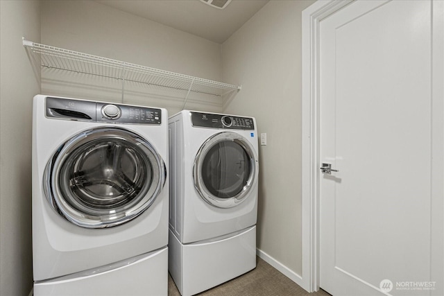 35404 55th Ave S, Auburn, WA 98001 - laundry room with independent washer and dryer and baseboards