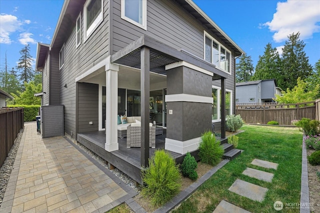35404 55th Ave S, Auburn, WA 98001 - back of property with a wooden deck and a fenced backyard