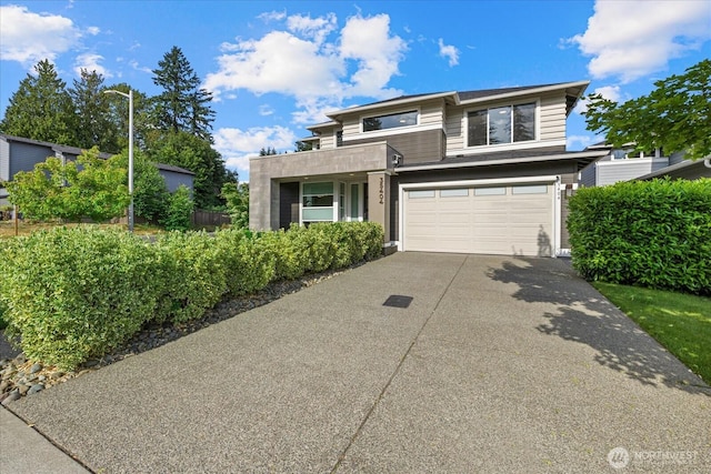 35404 55th Ave S, Auburn, WA 98001 - view of front of property with concrete driveway and a garage