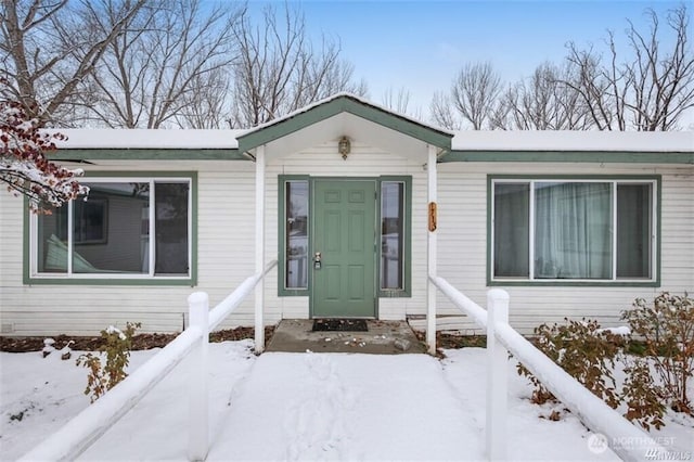 715 Locust St, Omak, WA 98841 - view of snow covered property entrance