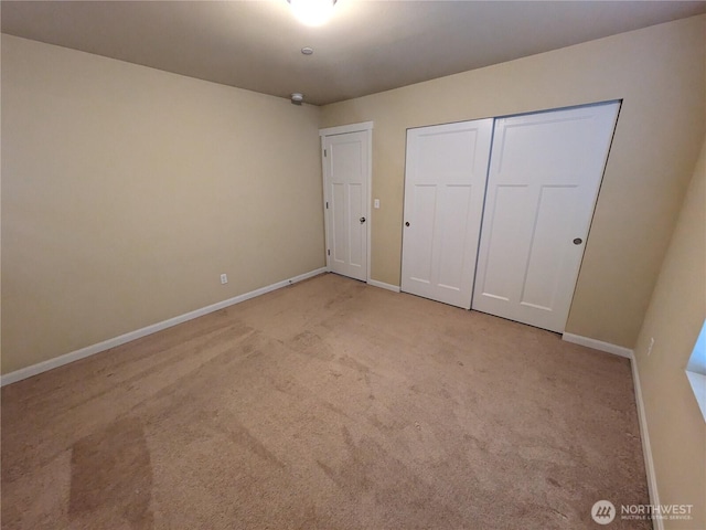 1077 Hiton Cir, Dupont, WA 98327 - unfurnished bedroom with carpet floors and a closet