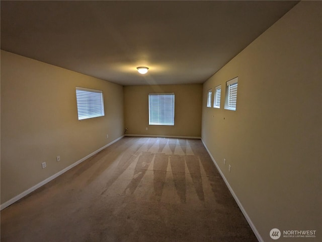 1077 Hiton Cir, Dupont, WA 98327 - empty room with light carpet and baseboards
