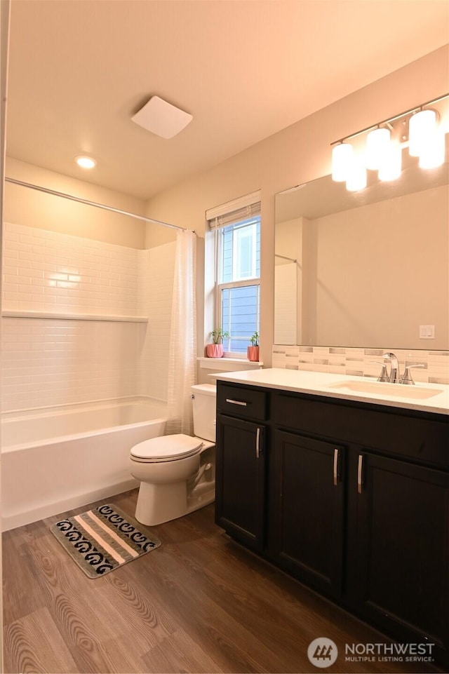 14363 271st Cir NE, Duvall, WA 98019 - full bathroom with wood finished floors, vanity, shower / tub combo, and recessed lighting