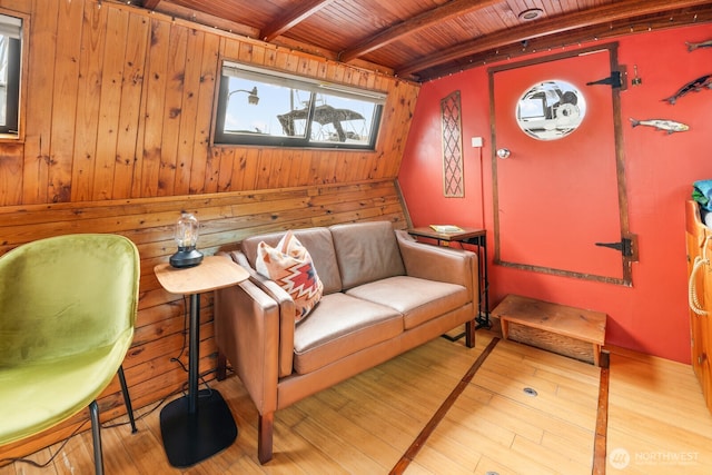 2550-2738 Westlake Ave N Unit 01-117, Seattle, WA 98109 - sitting room featuring a wooden ceiling with exposed beams, wood finished floors, and wood walls