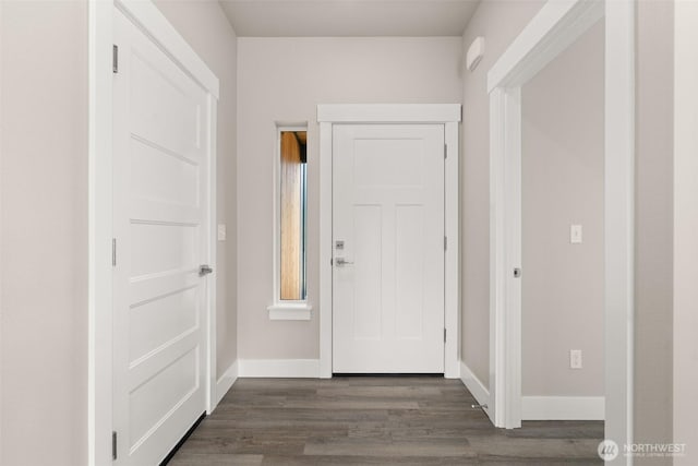2122 Hawks View Ln, Winlock, WA 98596 - foyer entrance featuring dark wood-style floors and baseboards