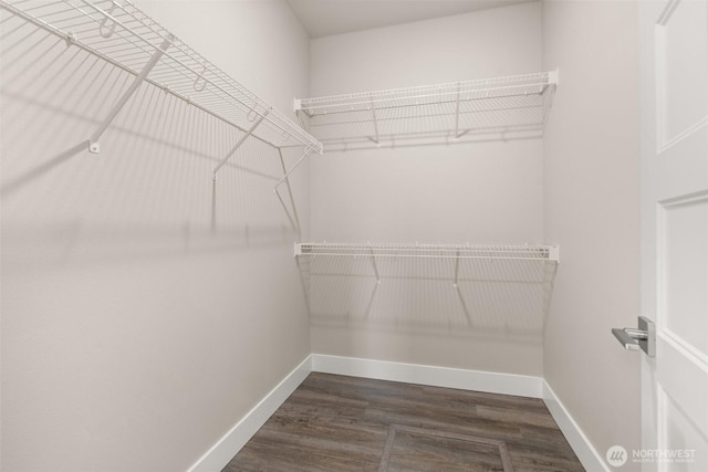 2122 Hawks View Ln, Winlock, WA 98596 - walk in closet featuring dark wood finished floors