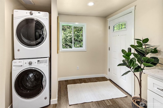8430 34th Ave S, Seattle, WA 98118 - laundry area with stacked washer / drying machine, wood finished floors, and recessed lighting