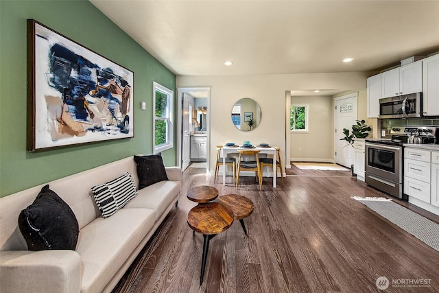 8430 34th Ave S, Seattle, WA 98118 - living room featuring recessed lighting and dark wood-type flooring
