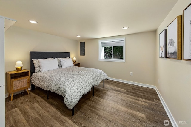 8430 34th Ave S, Seattle, WA 98118 - bedroom with dark wood-style floors, electric panel, and recessed lighting