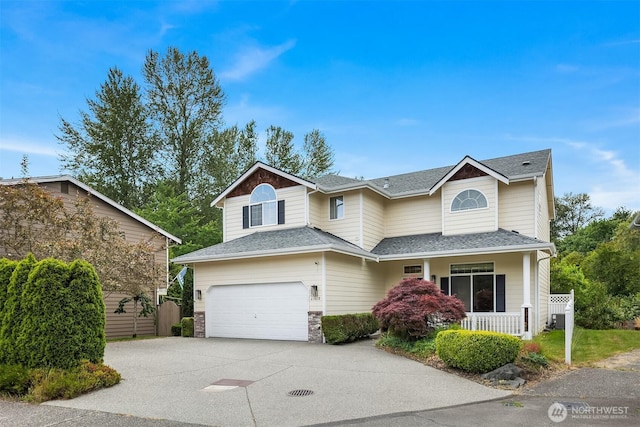 23618 Carter Rd, Bothell, WA 98021 - traditional-style house featuring a porch, driveway, and a shingled roof