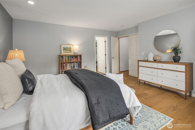 23618 Carter Rd, Bothell, WA 98021 - bedroom featuring light wood-style flooring, recessed lighting, and a closet