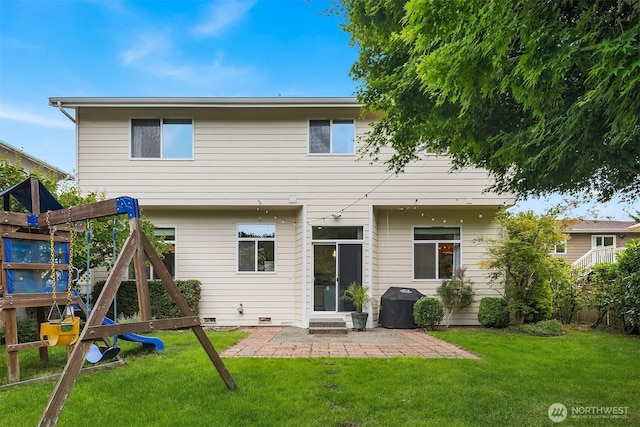 23618 Carter Rd, Bothell, WA 98021 - rear view of property featuring a playground, a patio area, and a lawn