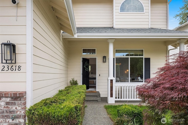 23618 Carter Rd, Bothell, WA 98021 - property entrance featuring covered porch and roof with shingles