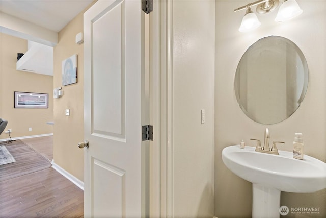 16922 SE 262nd St, Covington, WA 98042 - bathroom with baseboards and wood finished floors