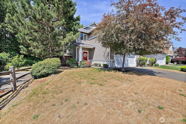 16922 SE 262nd St, Covington, WA 98042 - view of property hidden behind natural elements with asphalt driveway and a garage